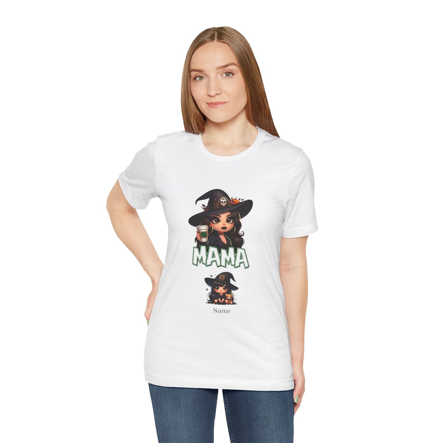 A woman with long hair is wearing a Printify Unisex Jersey Cute Witch Personalized Mama Short Sleeve Tee featuring witch-themed graphics. The white T-shirt showcases a witch holding a cup of coffee with the word "MAMA" in green letters. Below the main graphic is a smaller image of the same witch and a customizable placeholder for a name. She stands against a plain white background.