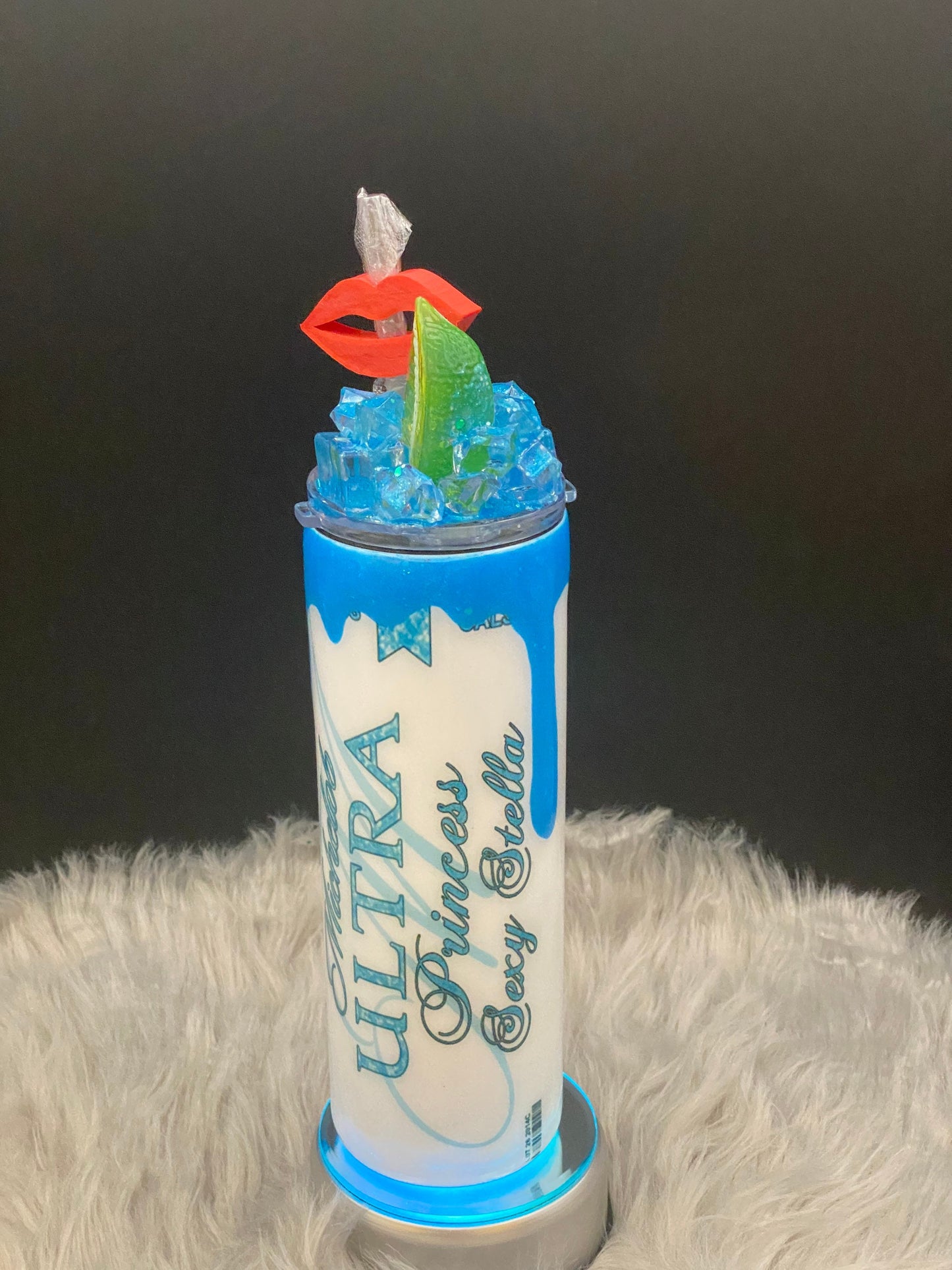 Michelob Ultra 20oz personalized tumbler with name of your choice. Custom lid, red lip straw charm, and teal glitter drips "Sexy" then name.